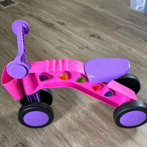 Vibrant Pink and Purple Kids Tricycle